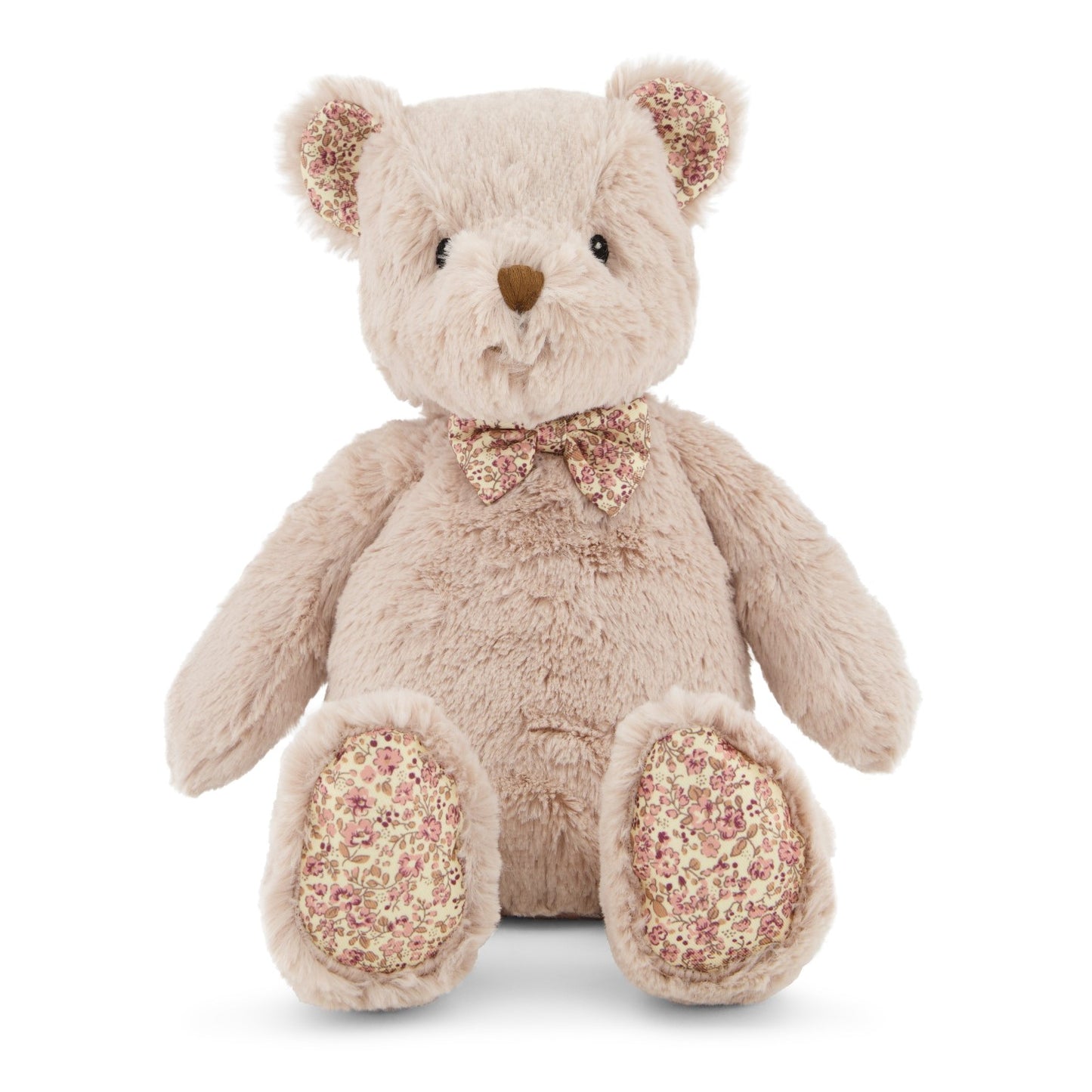 A plush teddy bear with a floral pattern on its paws and a bow tie.