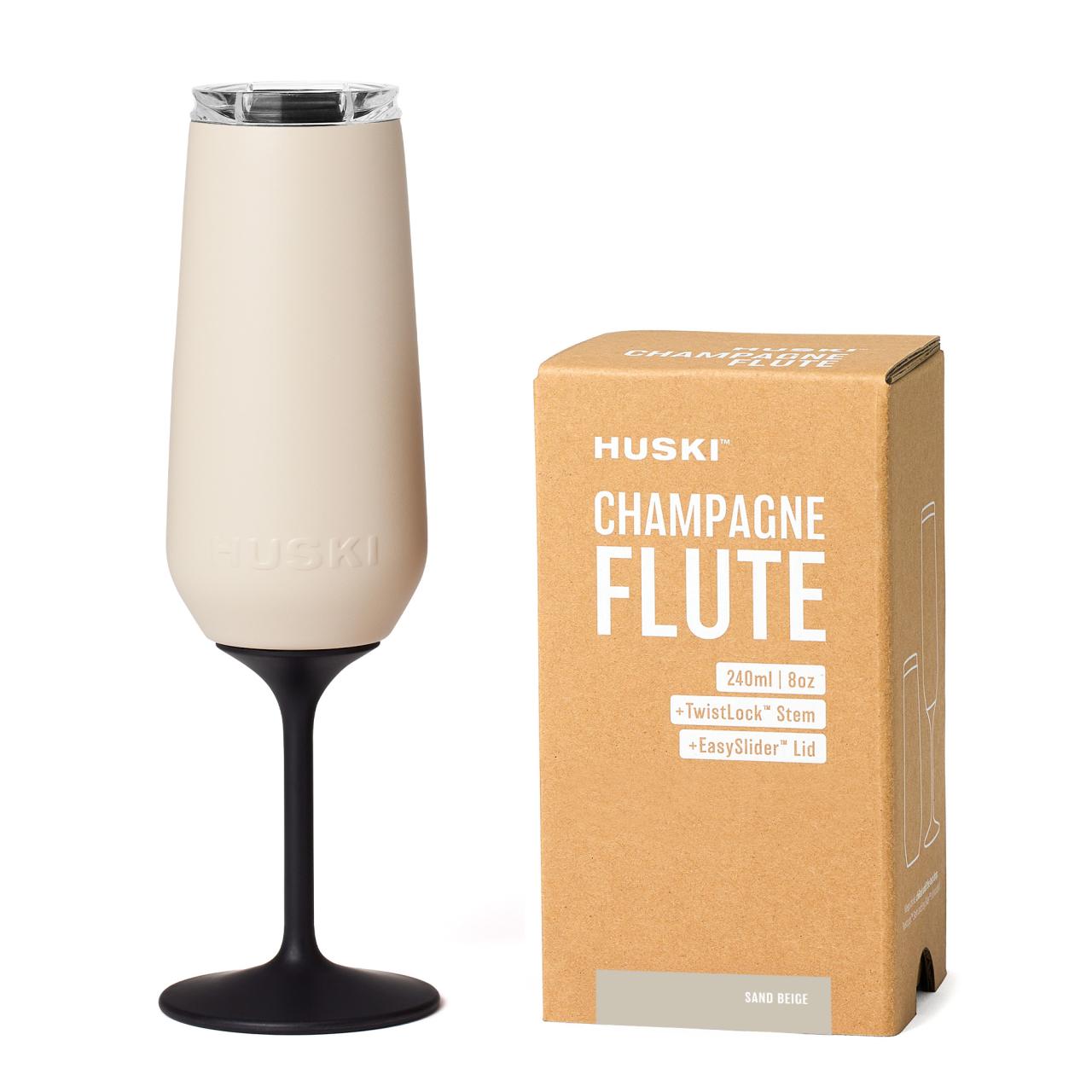 Beige champagne flute with black stem