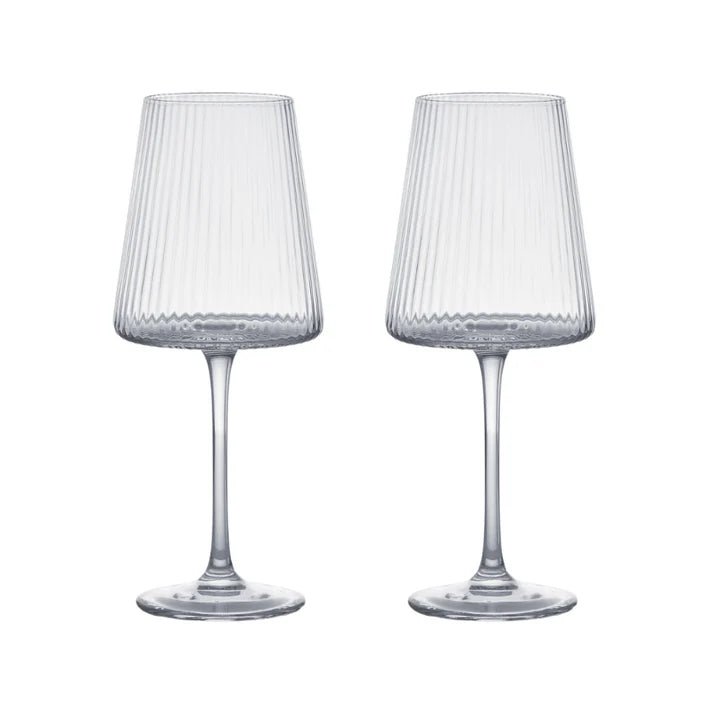 Clear wine glasses with complementary, fine, vertical optic which runs up and down each