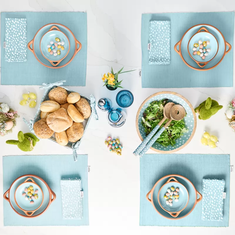 Set of kitchenware made from terracotta with a light blue glaze