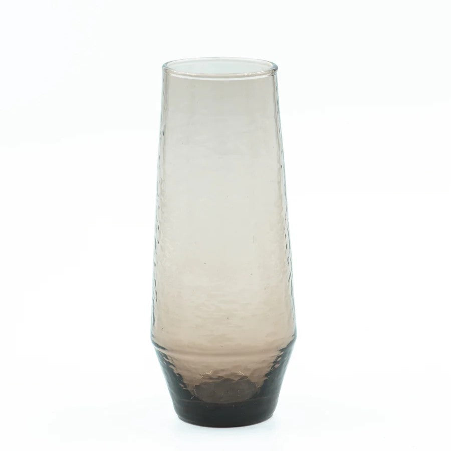 A bronze stemless champagne flute with a hammered texture, part of a set of four.