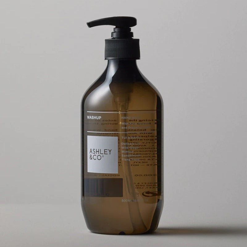 A brown pump bottle with a label displaying the brand name Ashley & Co.