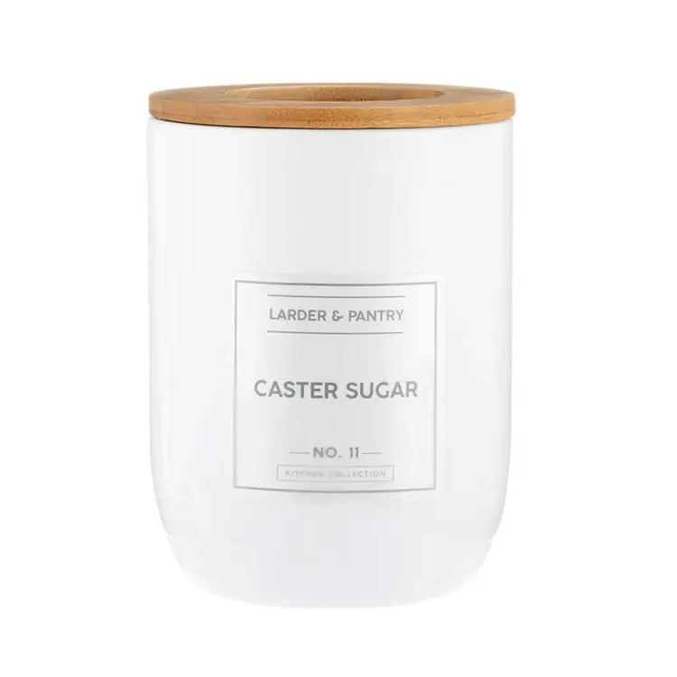 White container labeled 'Caster Sugar' with a wooden lid 