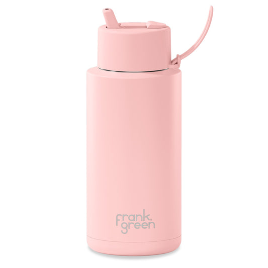 Pink Frank Green water bottle with straw lid on a white background