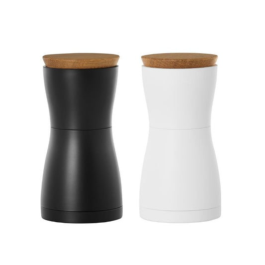 Black and white salt and pepper shakers with wooden tops 
