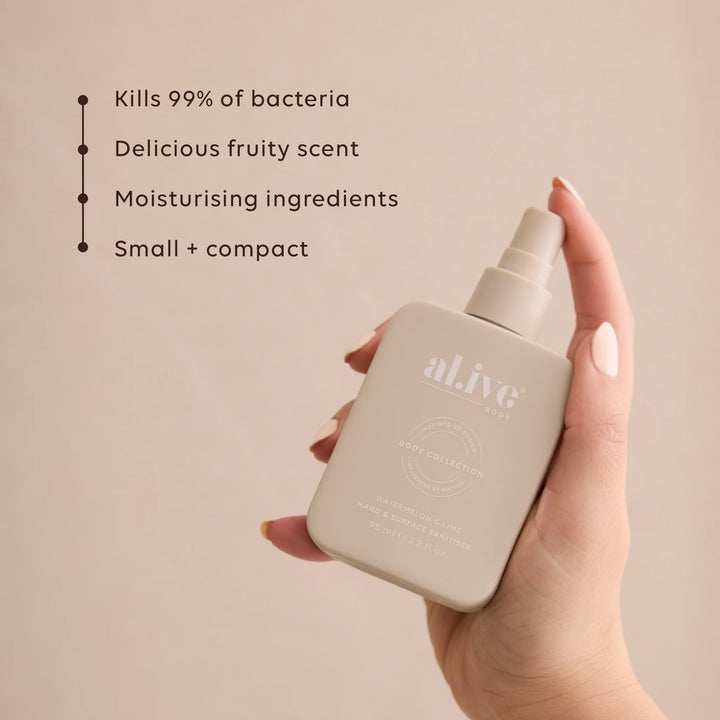 A hand holding an a.live body collector moisturising spray bottle against a soft beige background, with text listing product benefits on the left.