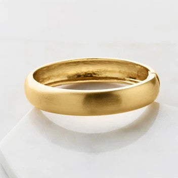 A brushed gold bracelet