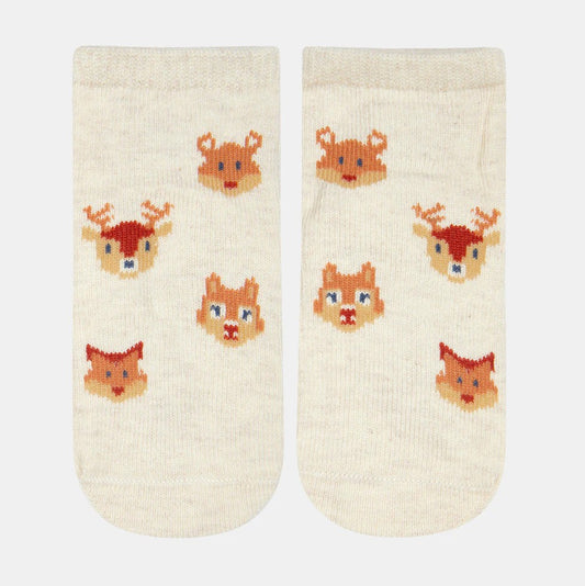 A pair of white baby socks with jacquard patterns of animals such as a deer and a fox