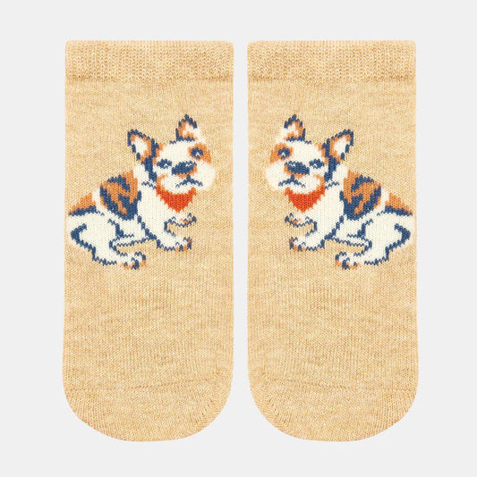 A pair of beige ankle socks with a jacquard pattern of a French Bulldog, featuring a hand linked toe and skid resistant sole grip.