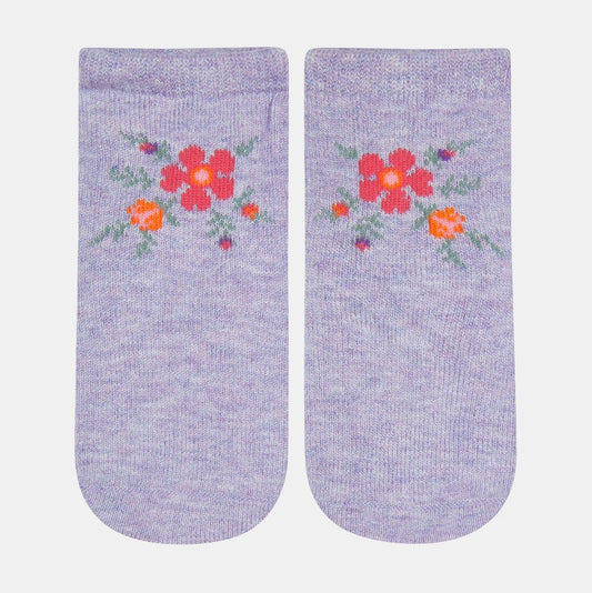 A pair of purple baby socks with a floral jacquard pattern.