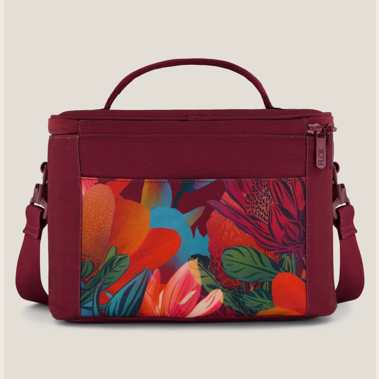 Floral-patterned cooler bag with a red border 