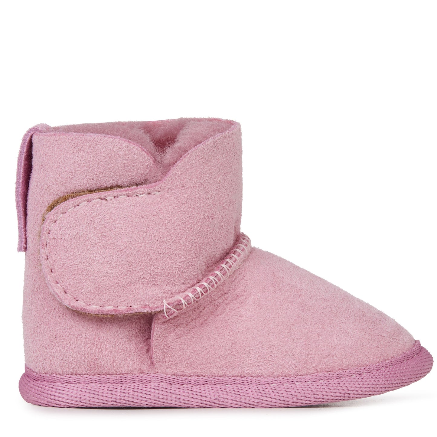 A single pink suede ankle boot with a soft plush lining, a decorative strap detail, and a textured sole, shown against a plain white background.