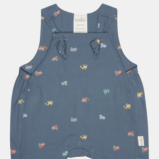 A baby romper with digger pattens made for baby wear
