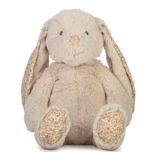 A beige plush toy in the shape of a bunny with long ears, a pink nose, and floral patterned feet.