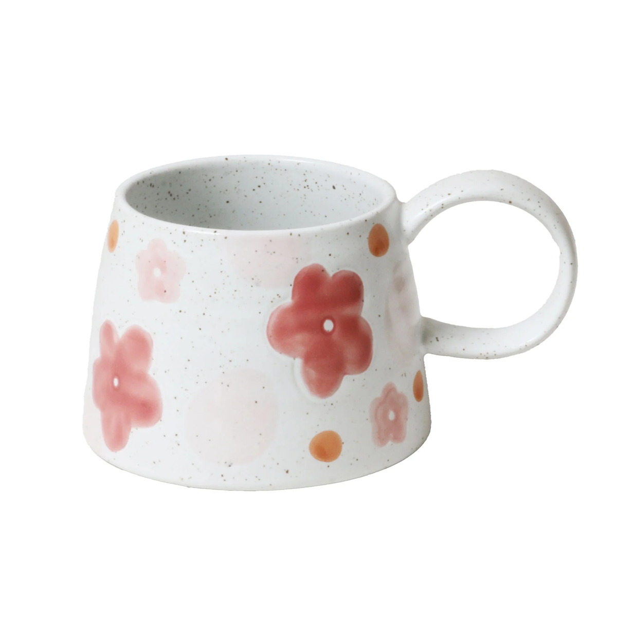 White mug with pink floral patterns on a white background