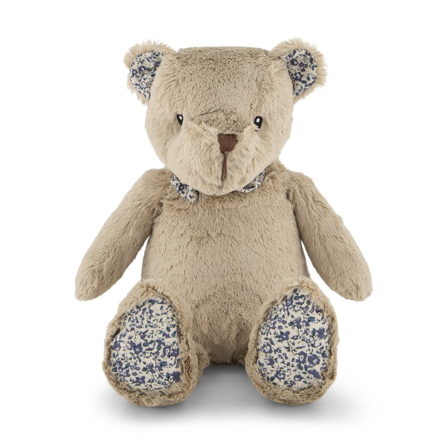 Plush teddy bear with floral patterns