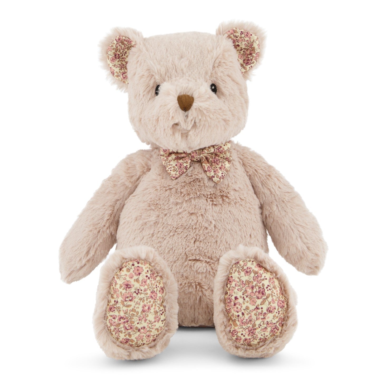 A plush teddy bear with a floral pattern on its paws and a bow tie.