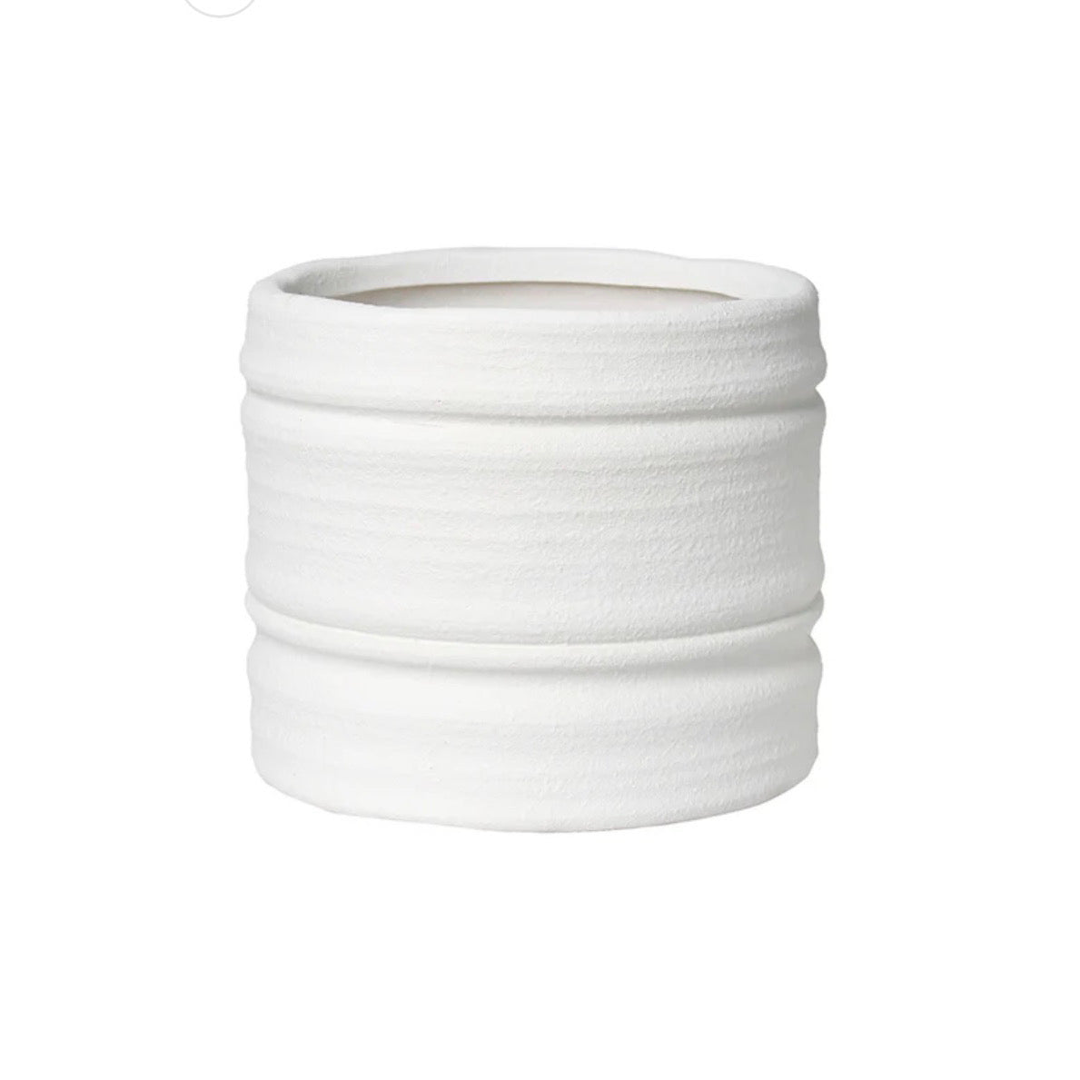 A white textured ceramic planter pot with horizontal ridges