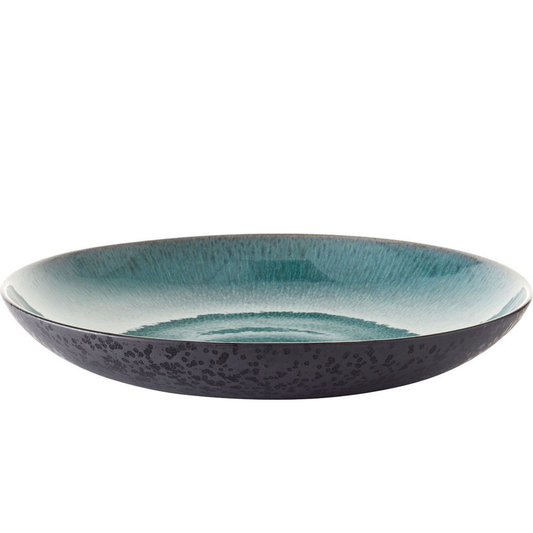 Teal ceramic plate with speckled pattern