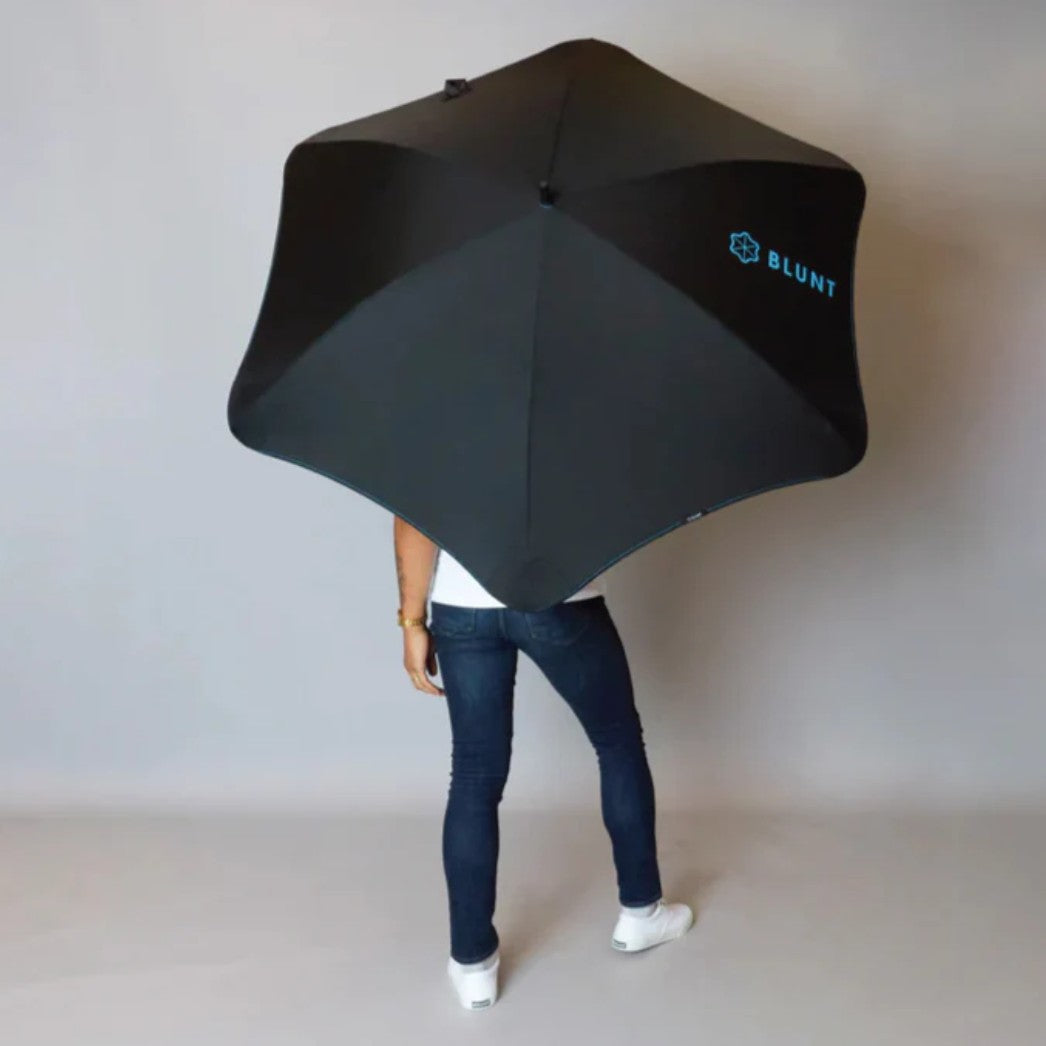  large black umbrella with 'BLUNT' branding