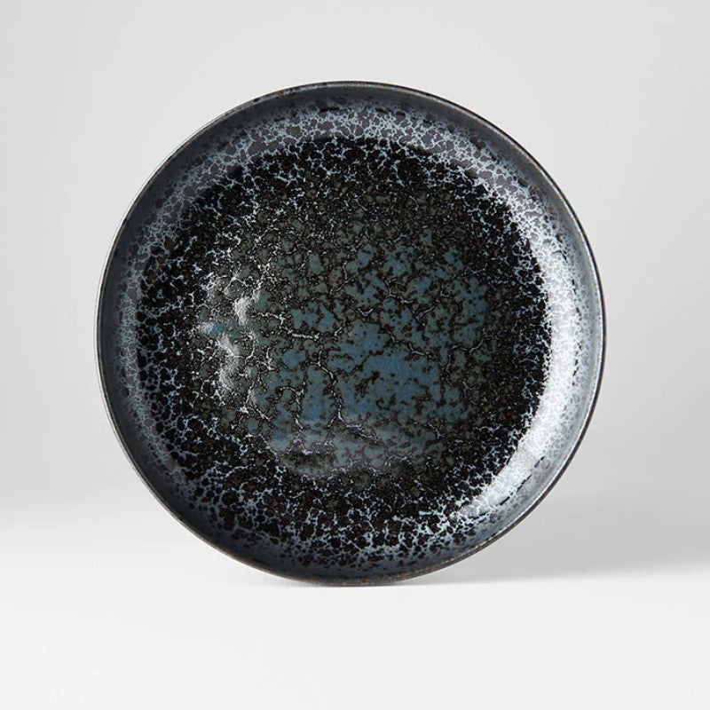 A high rim plate with a black pearl design, featuring a vibrant splash of gloss black against a matte black background with subtle highlights of cyan.