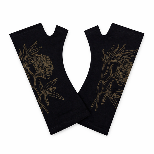 Black fingerless gloves with gold floral designs 