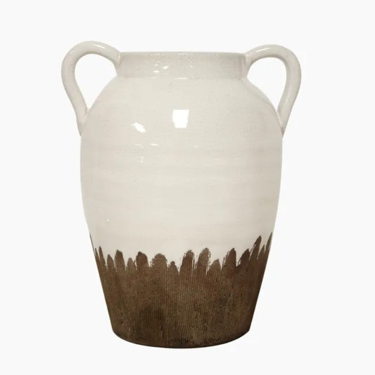 A large urn with handles featuring a glazed white finish on the upper portion and a raw terracotta base on the lower portion.
