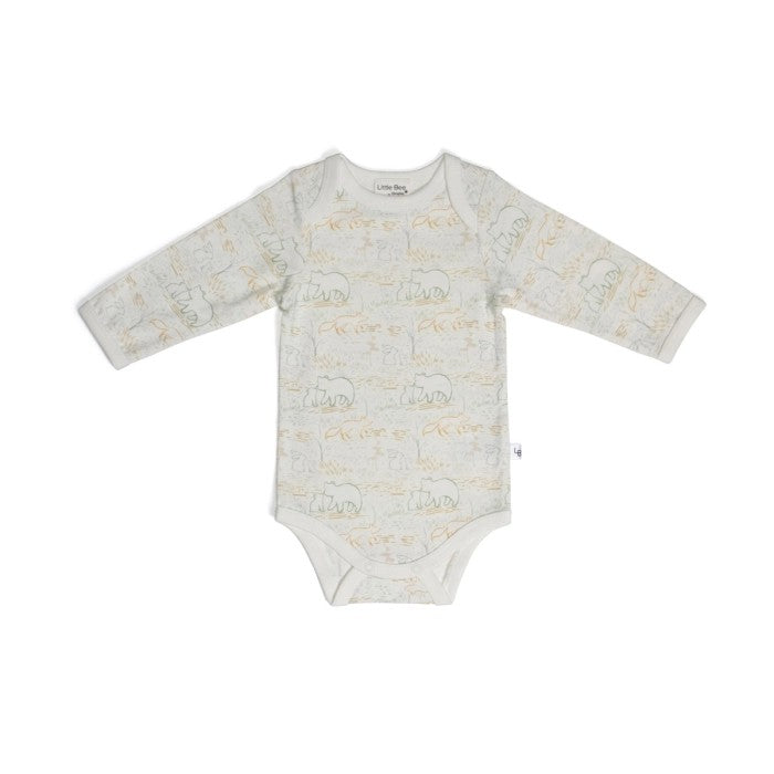 A long sleeve bodysuit for babies with a pattern of leaves and other plants in a beige color.