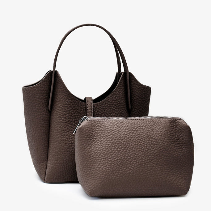 A dark brown pebbled leather handbag with a matching zippered pouch, 