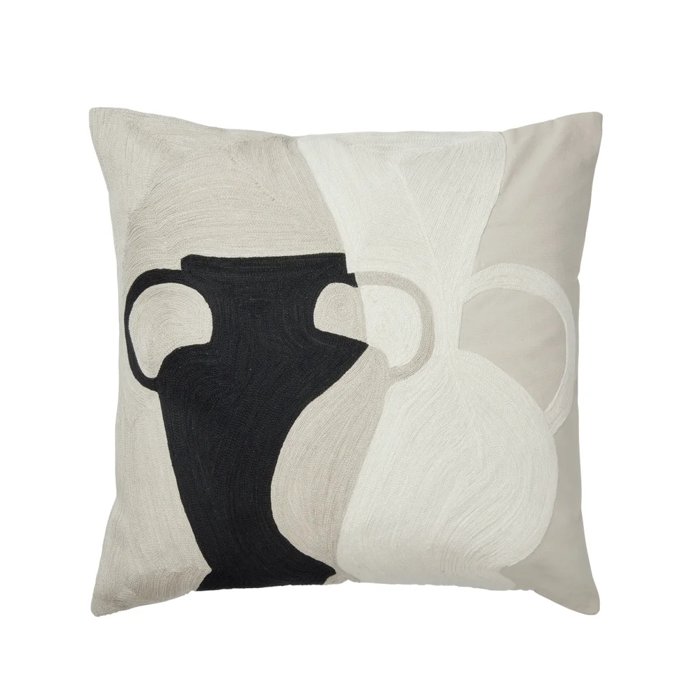 Cotton pillow with black and white vase design on a beige