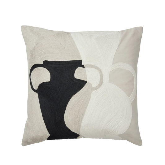 Cotton pillow with black and white vase design on a beige