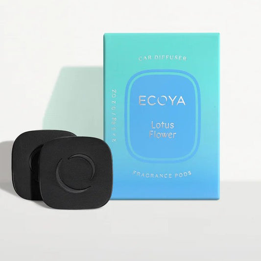 Ecoya car diffuser pod in Lotus Flower scent, with black circular fragrance diffusers
