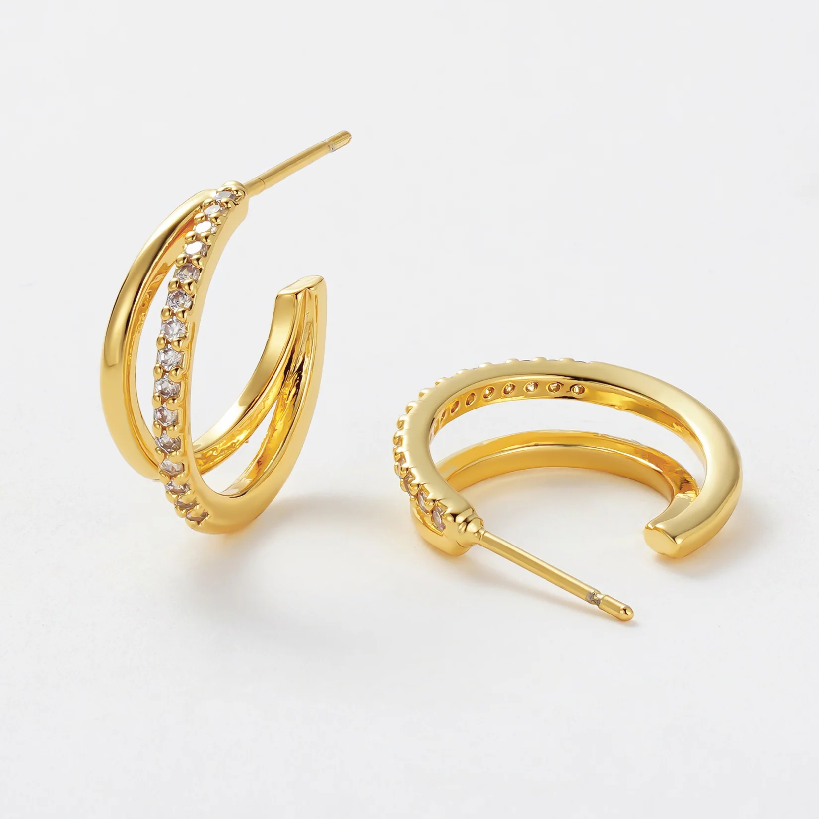 Gold hoop earrings with embedded diamonds 