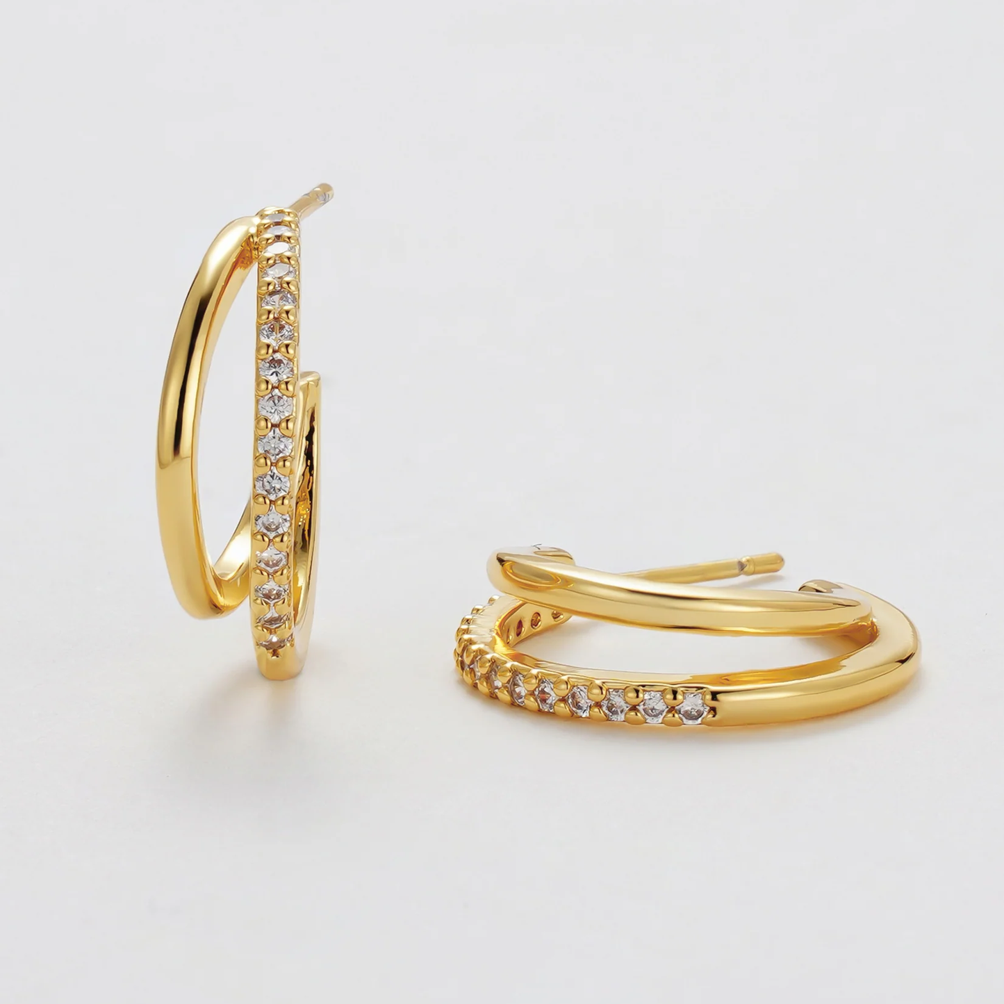 Gold hoop earrings with embedded diamonds 