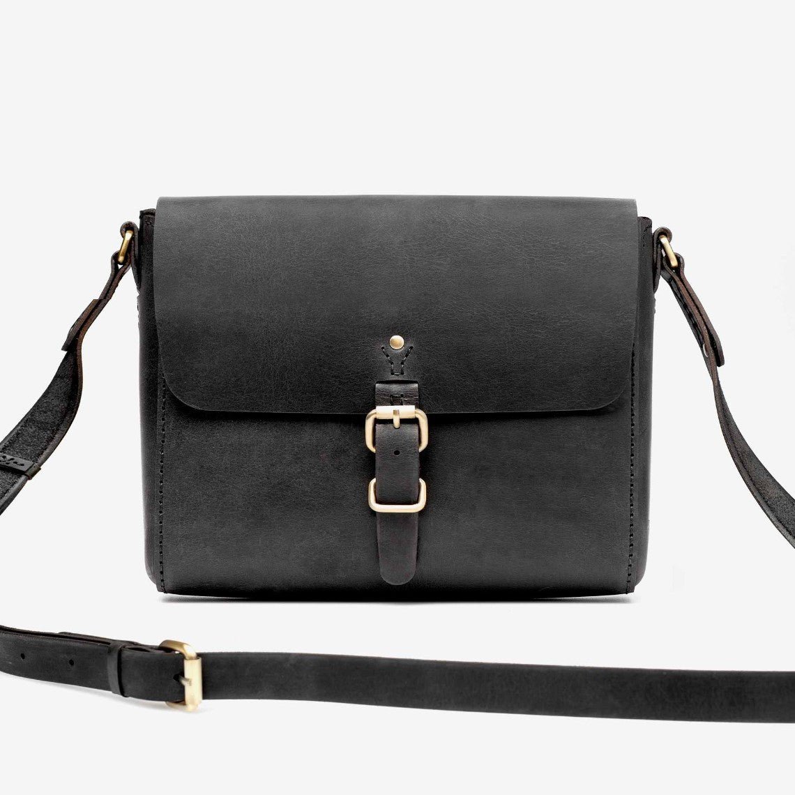 Black leather crossbody bag with gold buckle loyal