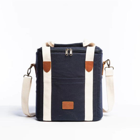 Navy cooler bag with leather details and striped interior, featuring a shoulder strap.