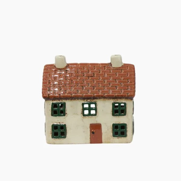 Small model of a house with a brick roof