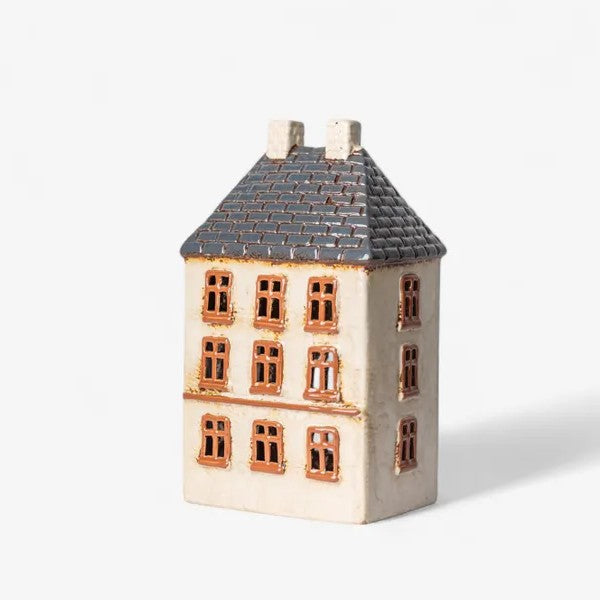 Ceramic house-shaped container with a grey roof 