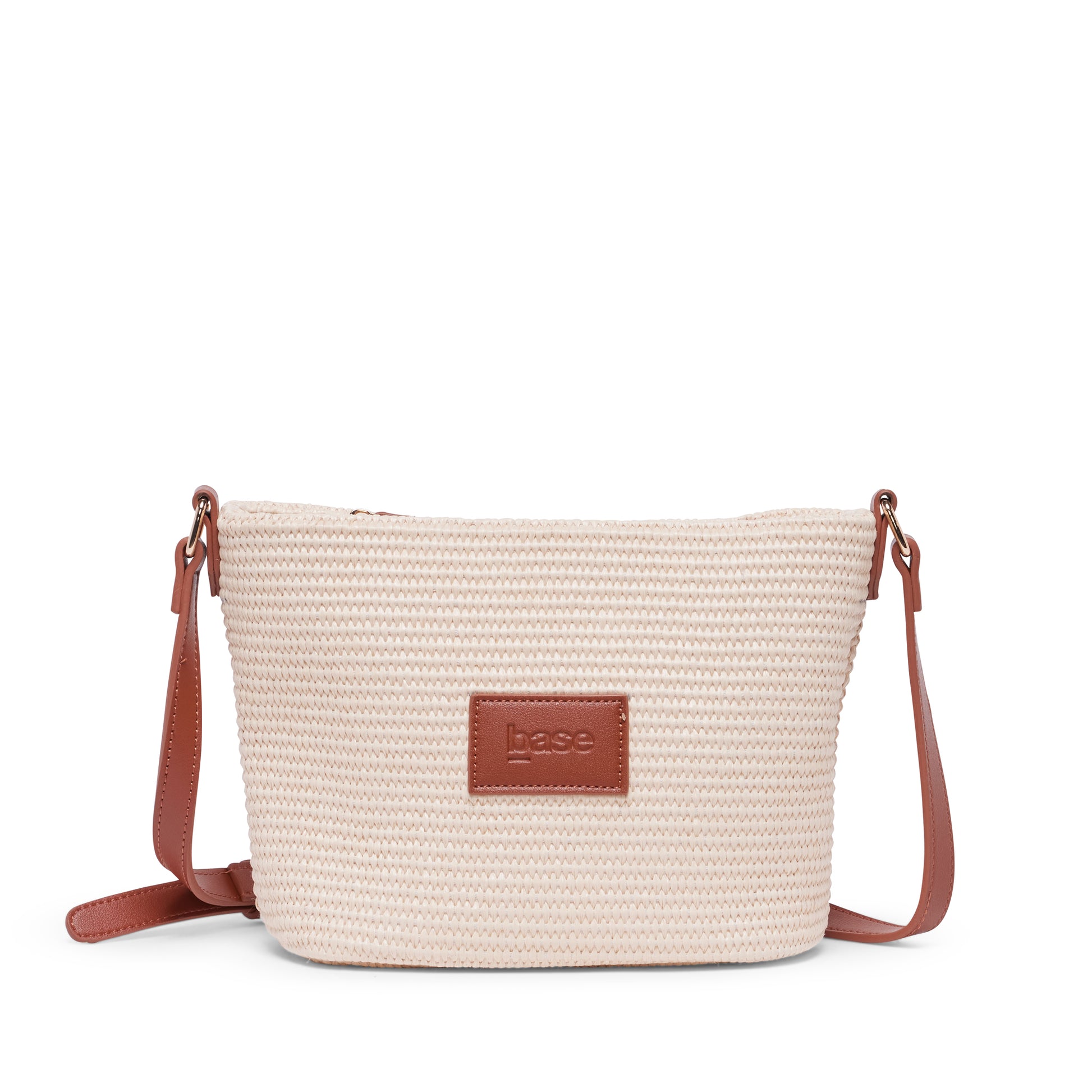 Beige straw bag with brown leather patch