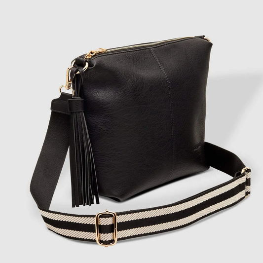 Black leather handbag with a striped strap