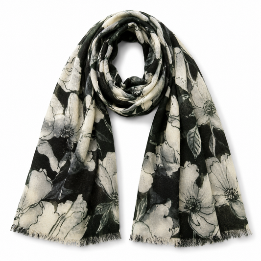 A lightweight Deep Green Merino Wool scarf with a green and off-white floral print, featuring fringed edges