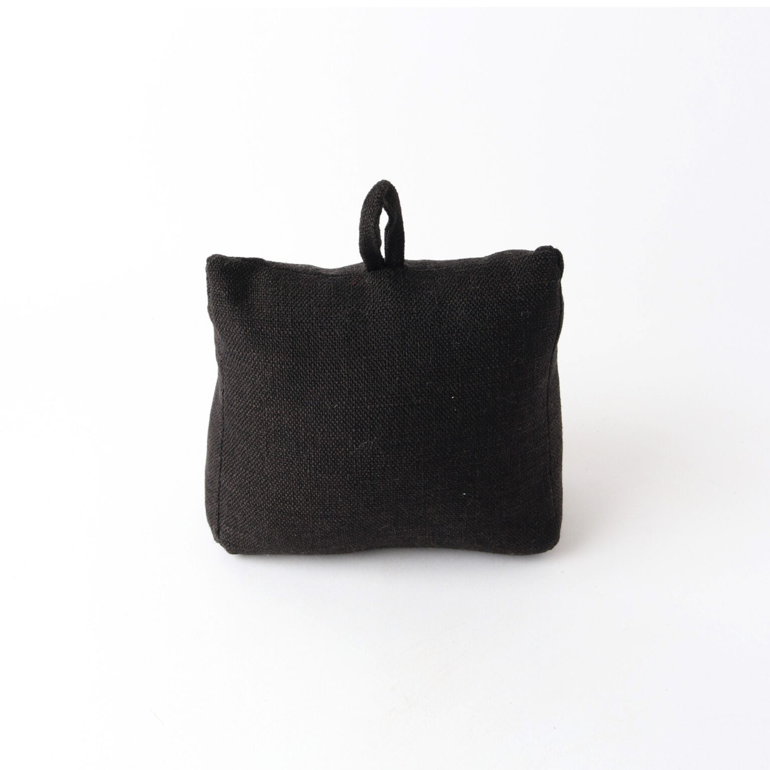 A small black fabric pouch with a top loop handle.

