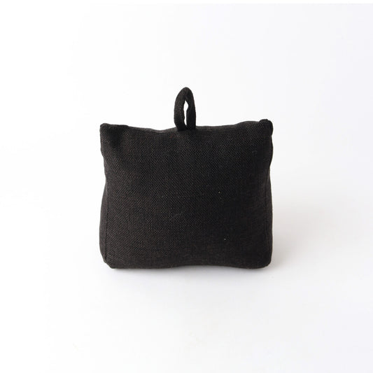 A small black fabric pouch with a top loop handle.
