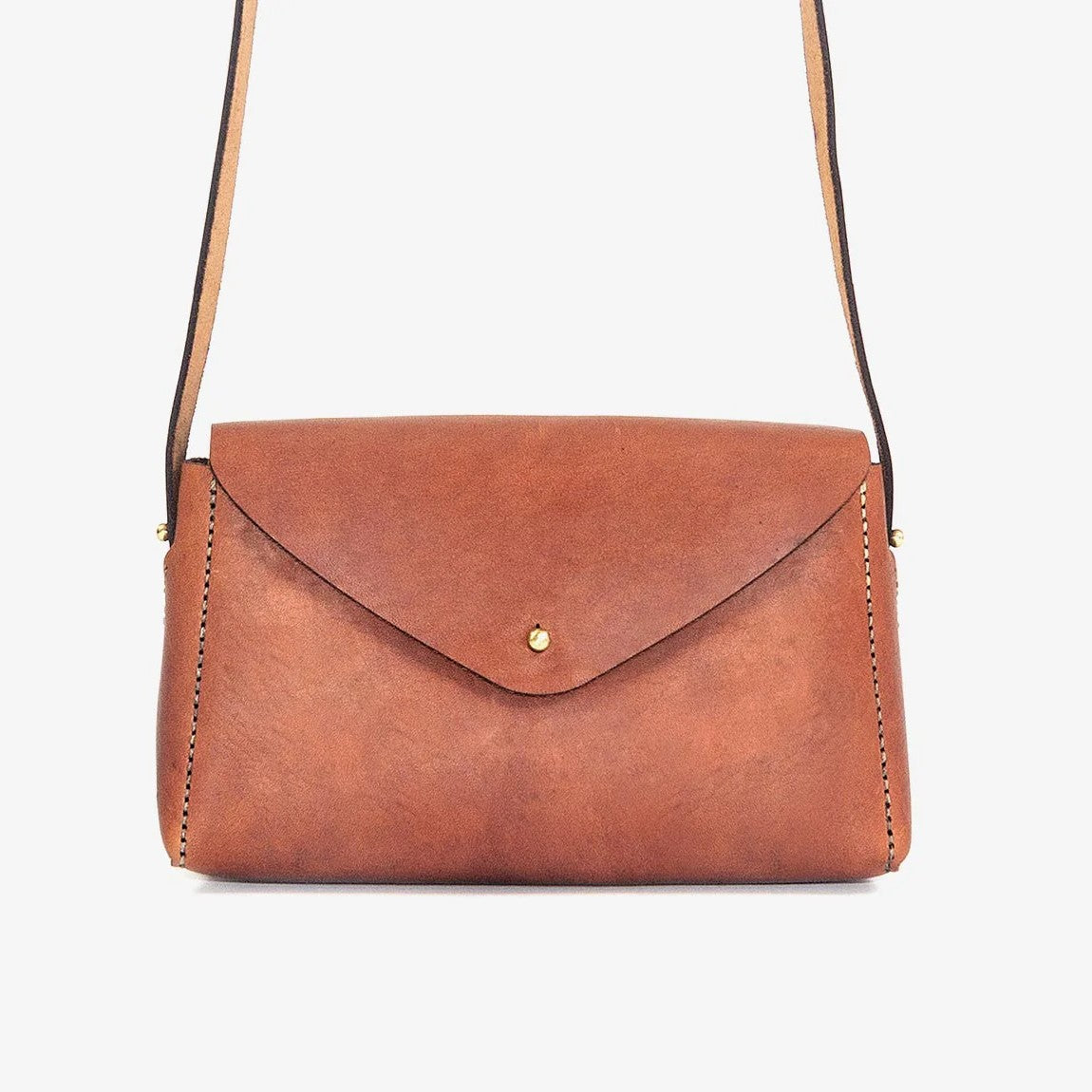 Brown leather handbag with a strap loyal