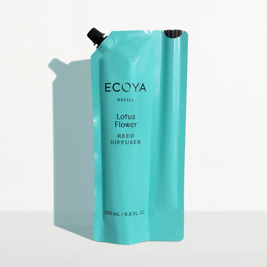 A turquoise refill pouch for an ECOYA Reed Diffuser, labeled 'Lotus Flower',