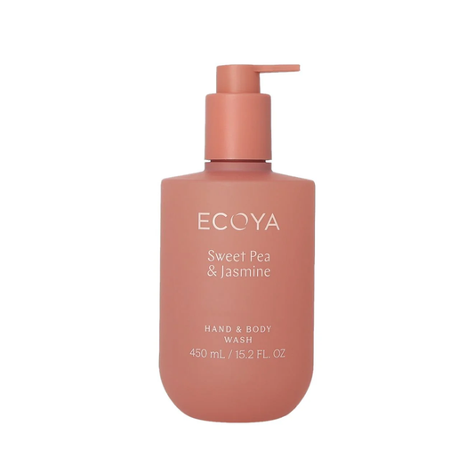 A bottle of ECOYA Sweet Pea & Jasmine hand and body wash in a dusty peach-pink color, featuring a matching pump dispenser, set against a plain white background.