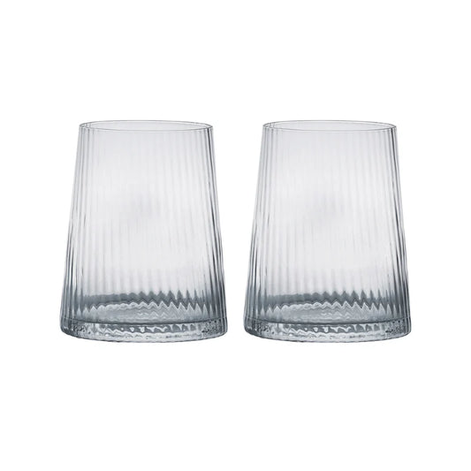 A pair of clear drinking glasses with a fine, vertical optic which runs up and down the glass 