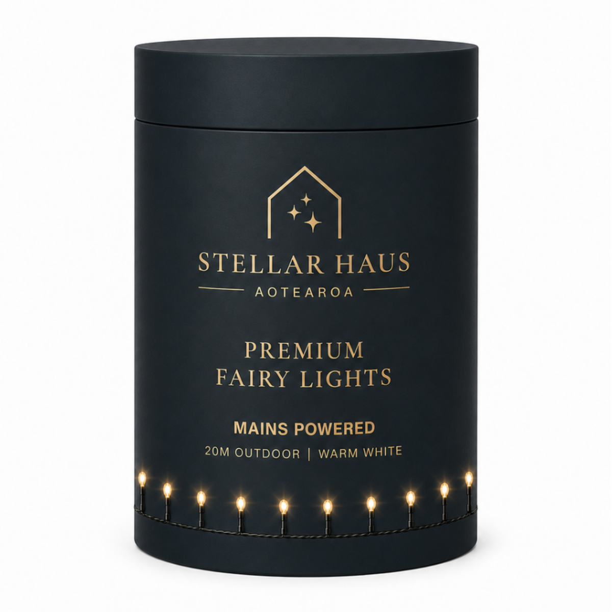 A matte black cylindrical candle tin for Stellar Haus Aotearoa, featuring gold lettering and a string of warm white fairy lights printed around the lower edge, shown on a clean white background.