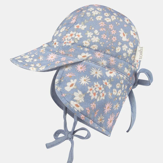 A blue and white floral-patterned baby sun hat with a contoured neck flap and adjustable head ties.