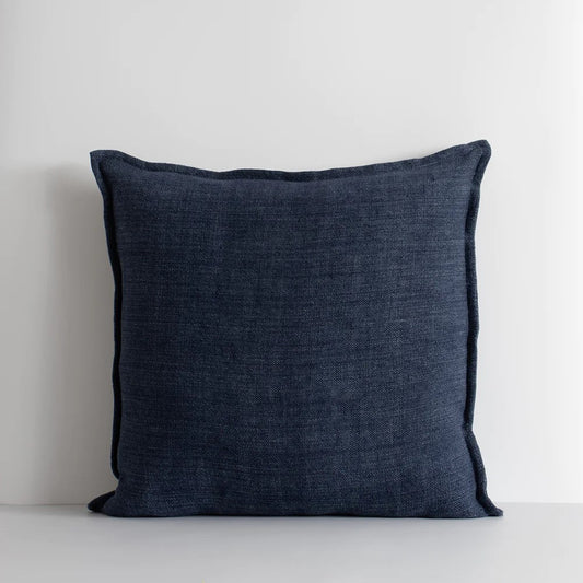 A navy blue linen cushion with a 1cm flange edge,